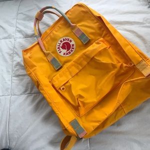 yellow fjällräven kânken backpack